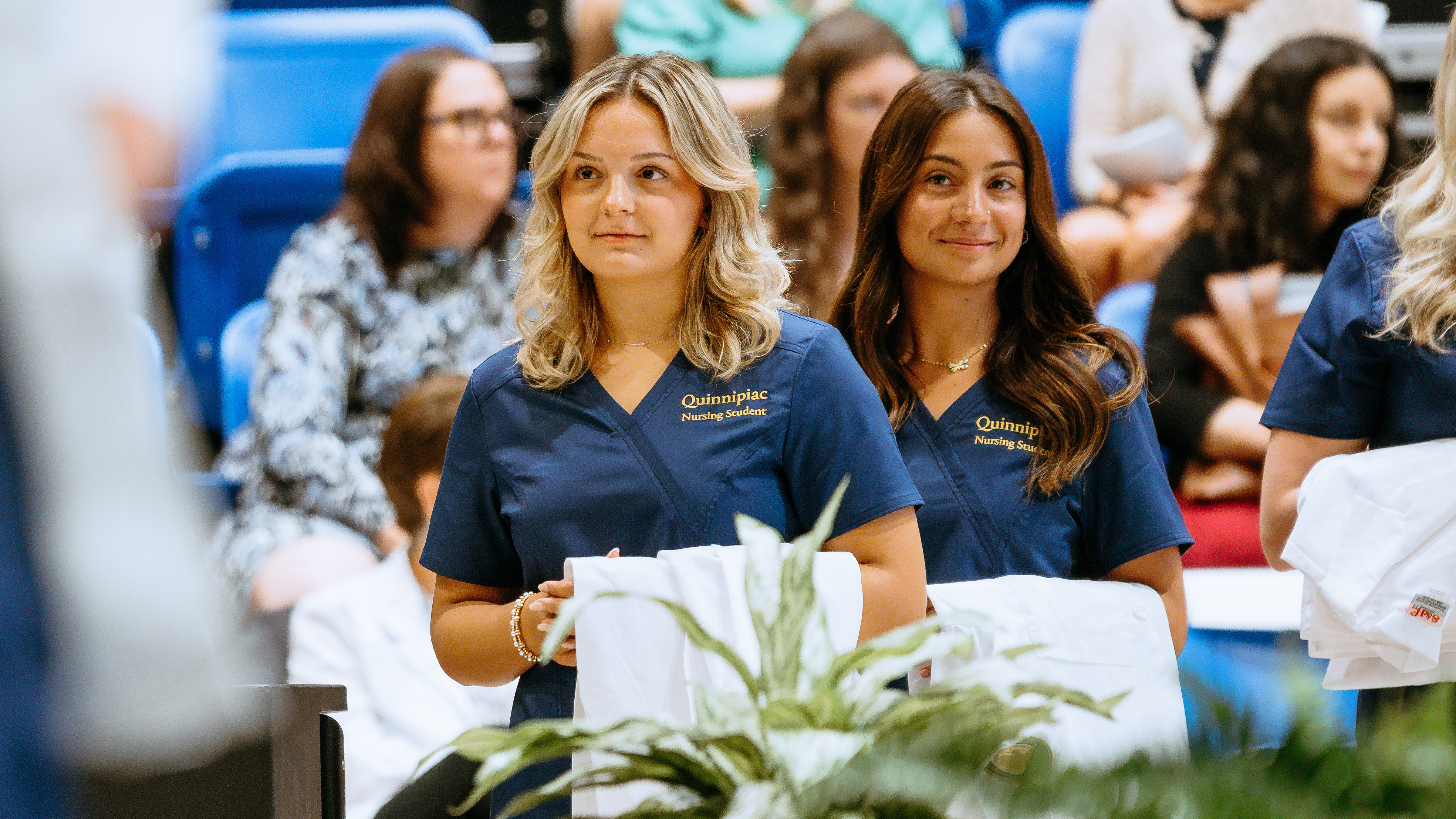 Two nursing students smiling at camera