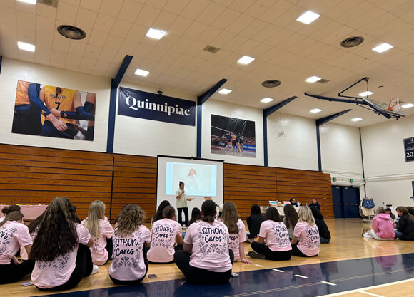 Students sitting on the floor