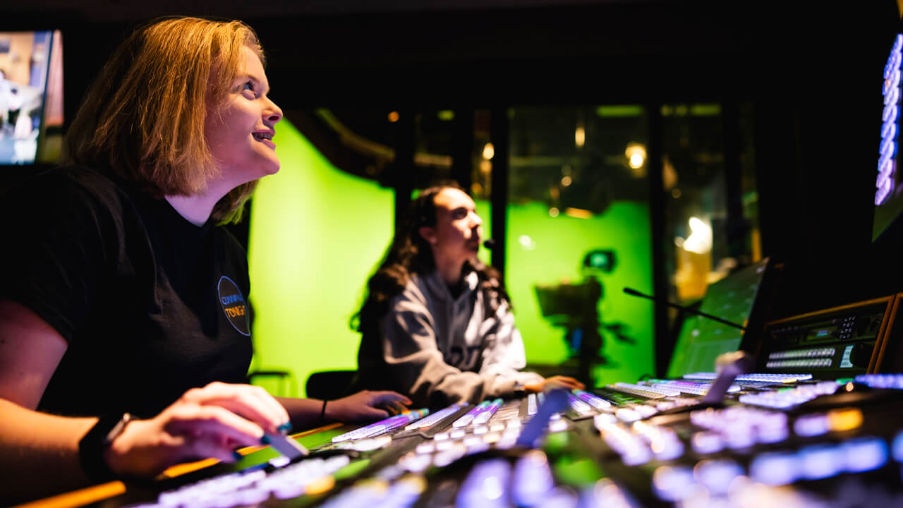 Students collaborate in the McMahon Center control room.