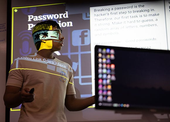 Photo of Mohammad Alkuwaiti participating in Quinnipiac's Hacker High School