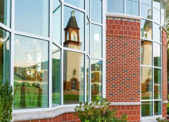 Clocktower reflection in glass